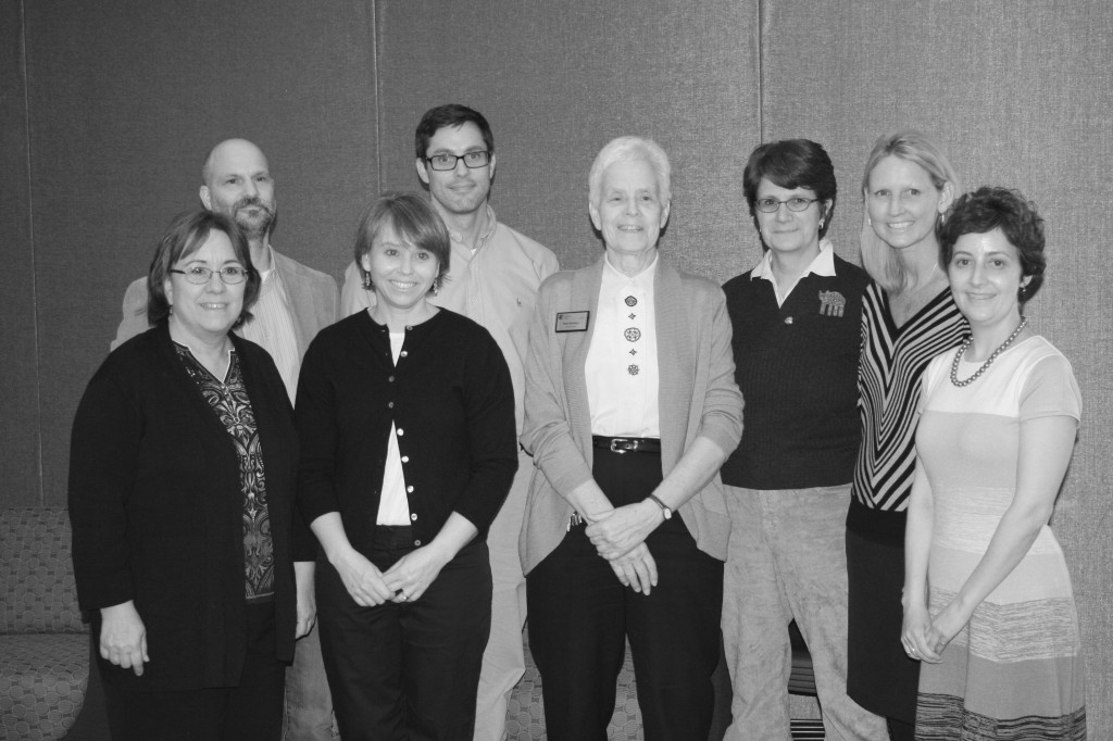 Pam McIntyre and the finalists pose for a group picture.