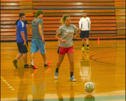 Students of the Soccer/Hoc-Soc PE class use the Meramec gym to play soccer. Soccer/Hoc-Soc is a one-credit class held on Tuesdays and Thursdays from 11-11:50 a.m. in the gym. | PHOTO: DAVID KLOECKENER