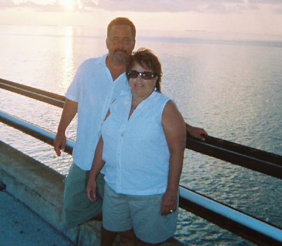 The late Mary Herzog, right, poses with her husband, Mike, on a recent vacation.